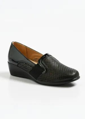 Perforated loafers with fancy details