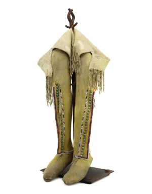 Southern Plains Beaded Leather Moccasins with Stand c. 1880s, 21" x 9" x 6" (DW92323A-0123-001)