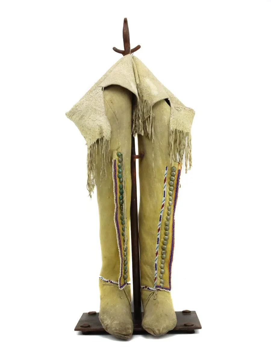 Southern Plains Beaded Leather Moccasins with Stand c. 1880s, 21" x 9" x 6" (DW92323A-0123-001)